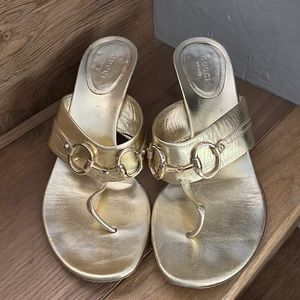 Gucci about 2 inch heeled shoes.  Gold.  Size 8.